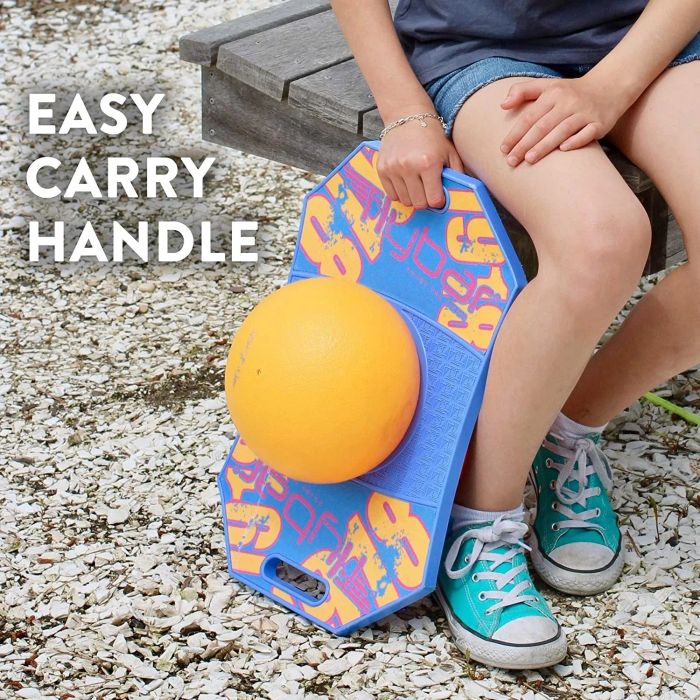 A blue and orange pogo ball being held by its handle