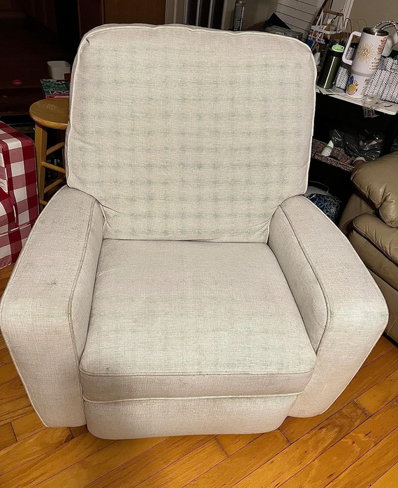 An after image of the same armchair, now free of stains and looking clean.