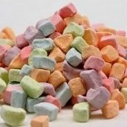 A pile of tiny cereal marshmallows