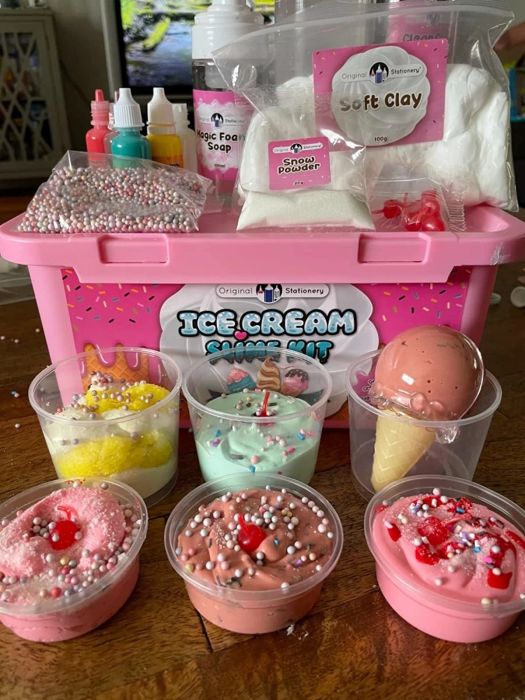 A photo shared by the reviewer displaying their slime ice cream creations placed in front of the kit.
