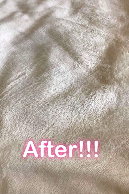 An after photo showing the blanket restored to its original, stain-free condition