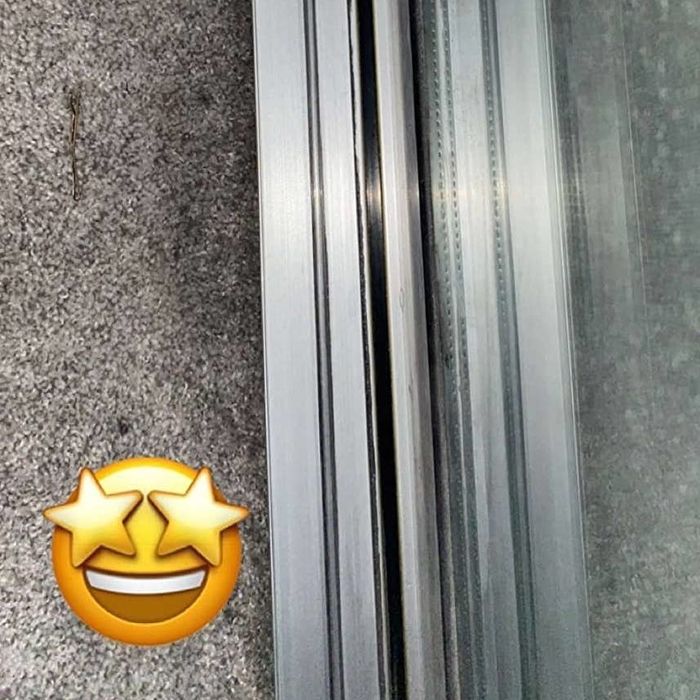 A reviewer's door track appears spotless and well-maintained.