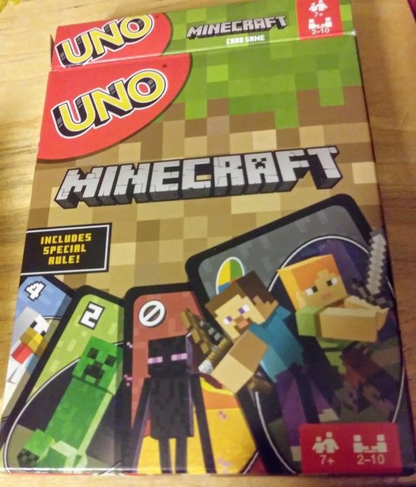 A reviewer's photo showcasing the Uno Minecraft card game in action