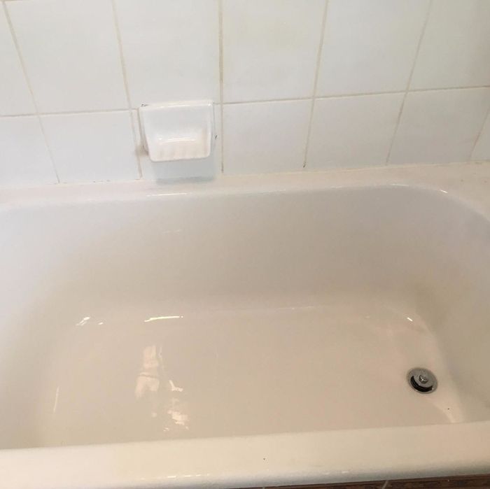 The reviewer's after photo revealing a brilliantly clean, white tub