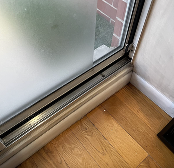 The same windowsill, now spotless and gleaming