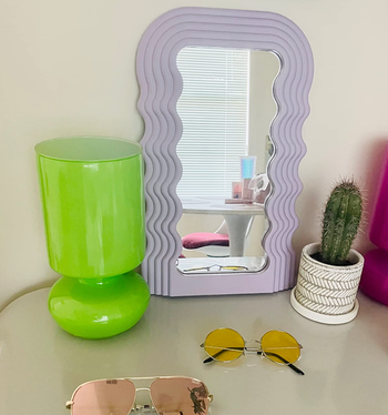 A reviewer's mirror in purple