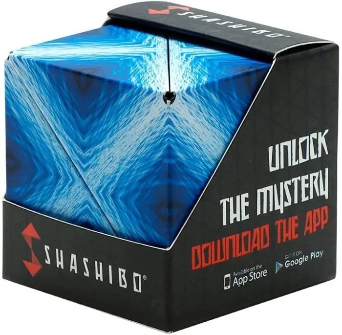 The blue puzzle cube inside its packaging