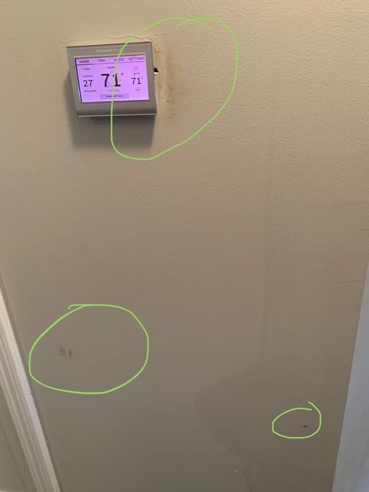 A reviewer’s wall before using the wall cleaner.