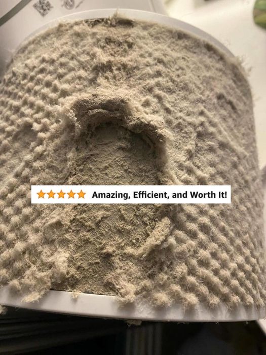 A close-up shot of a filter, completely coated in dust, with a five-star review overlaid.