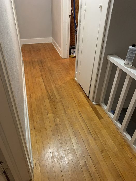 On the right: the same hardwood floor appears shinier with less fading after applying the polish and conditioner from above.