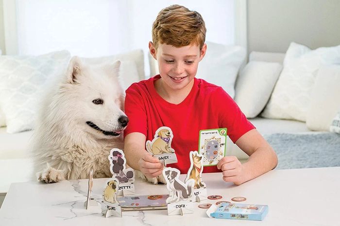 A child and a dog enjoying a game together on a board.
