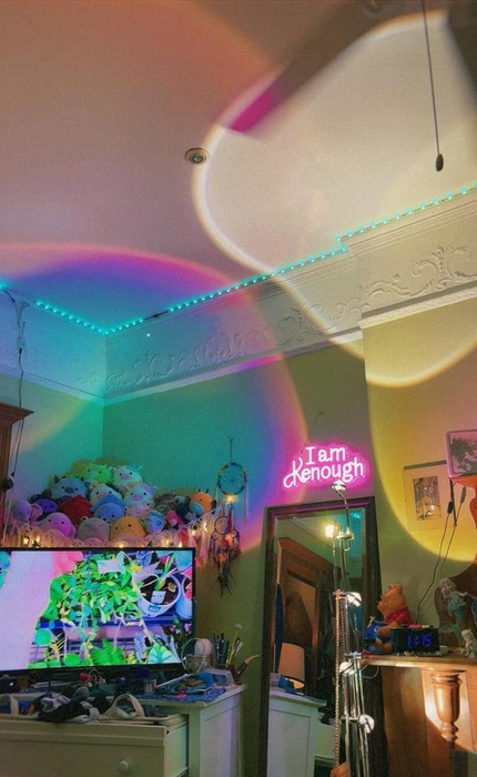A reviewer's room filled with halo projections adorning the walls and ceiling