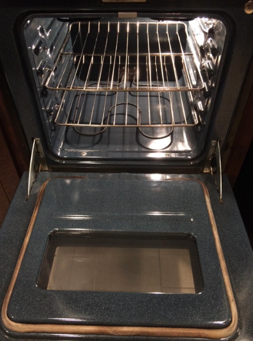 After: the same oven interior, now gleaming, spotless, and a rich deep blue.