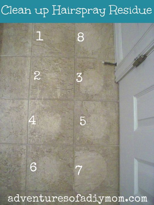 The blogger's bathroom tile floor, testing various cleaners on seven tiles. One tile stands out, noticeably cleaner than the rest.