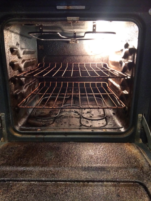 Before: an oven interior coated with a thick, stubborn layer of baked-on grime and grease.