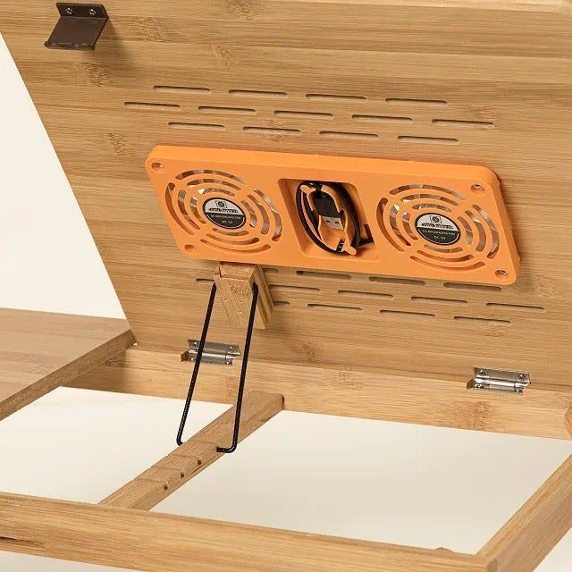 A bamboo laptop stand with integrated cooling fans and adjustable legs, designed for comfortable device use whether working or shopping.