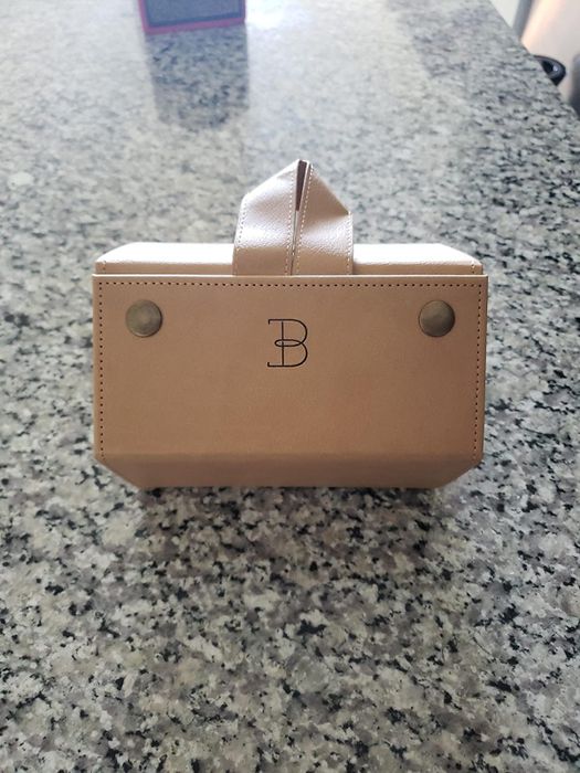 A reviewer’s image of the case fully closed, demonstrating how compact it can become.