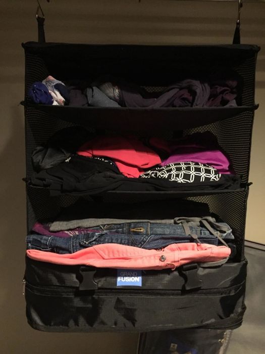 a packing cube hanging in a closet