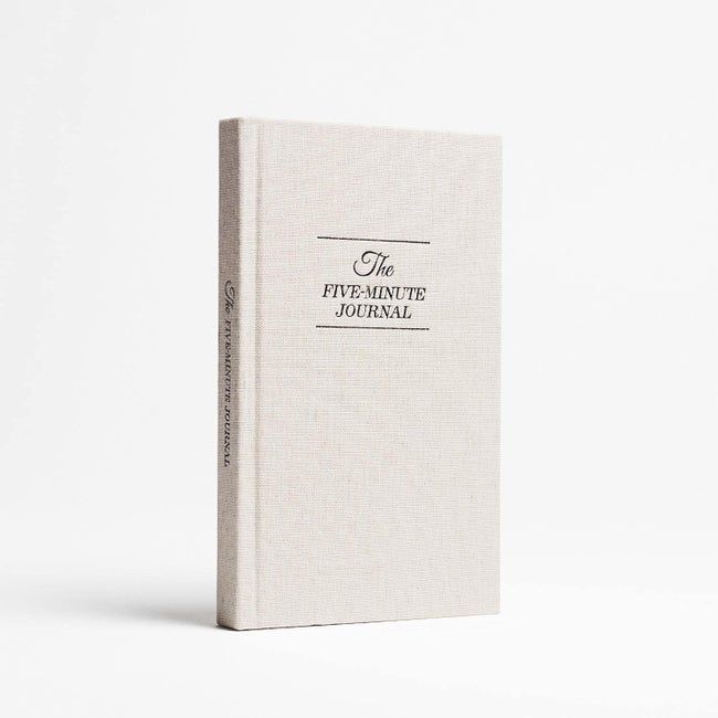 The journal featuring a minimalist white cover