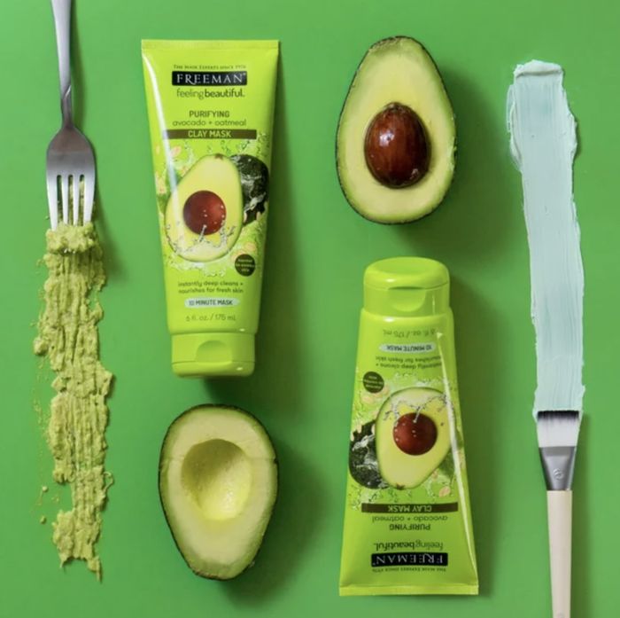 A set of two mask tubes with sliced avocados and swatches.