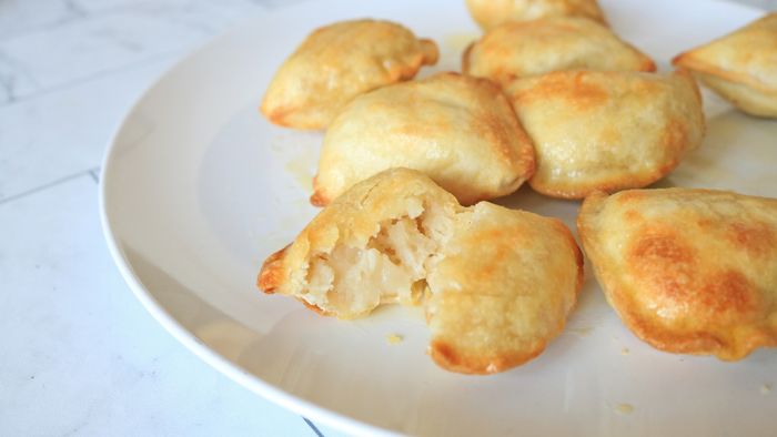 A plate of crispy air-fried pierogi.