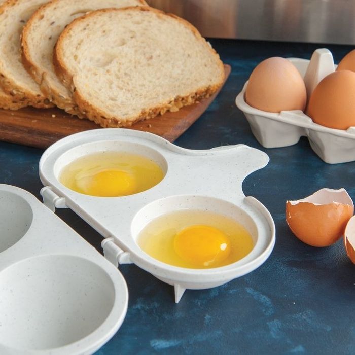 The egg poacher with two yolks inside