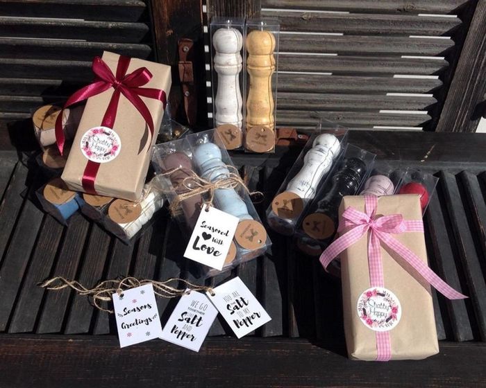 a collection of wrapped salt and pepper mills