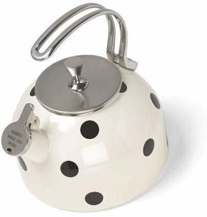 A white kettle adorned with black polka dots, bringing a fun and playful vibe to your countertop.