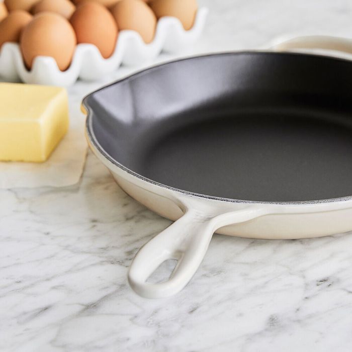 the white cast-iron skillet