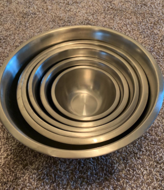 A reviewer's snapshot of the neatly stacked stainless steel bowls.