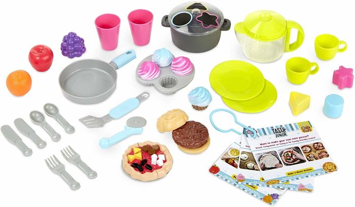 The assortment of accessories that come with the Little Tikes kitchen set, complete with all the essentials for little chefs.
