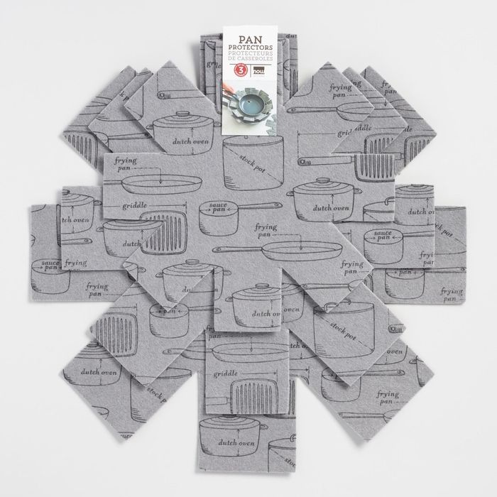 grey foam inserts shaped like asterisks designed to be placed between pots to prevent damage