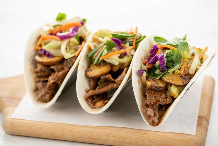 hoisin steak tacos with asian sesame slaw and mushrooms