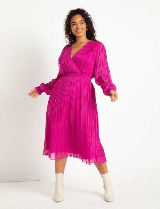 a model showcasing the dress paired with white ankle boots
