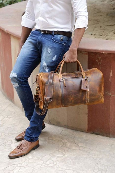 A model holding the bag