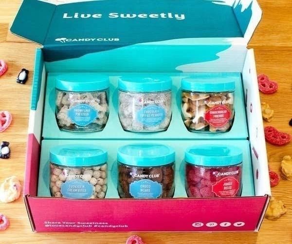 A box of six cups of candy