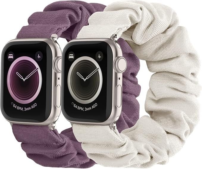 Two smartwatches featuring fabric scrunchie bands, one in a vibrant purple and the other in classic white, adding a chic touch to everyday wear.