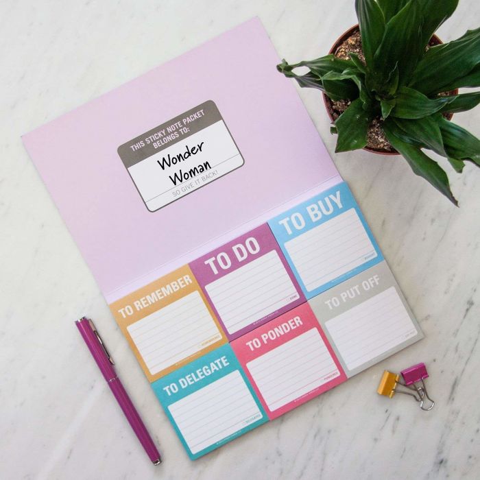 The sticky notes feature labels such as 'to remember,' 'to do,' 'to buy,' 'to delegate,' 'to ponder,' and 'to put off.'
