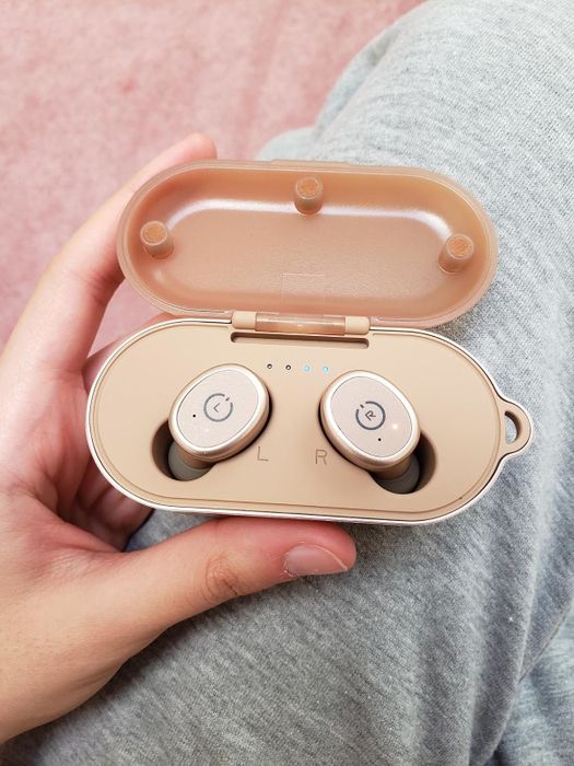 Rose gold Tozo earbuds.
