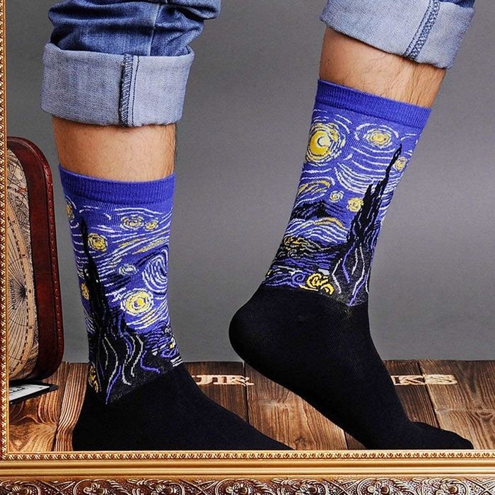 These socks feature the iconic 'Starry Night' artwork, perfect for adding a touch of culture and creativity to your wardrobe.