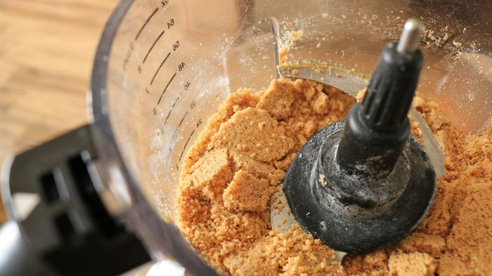 Toasted walnuts ground up in a food processor.