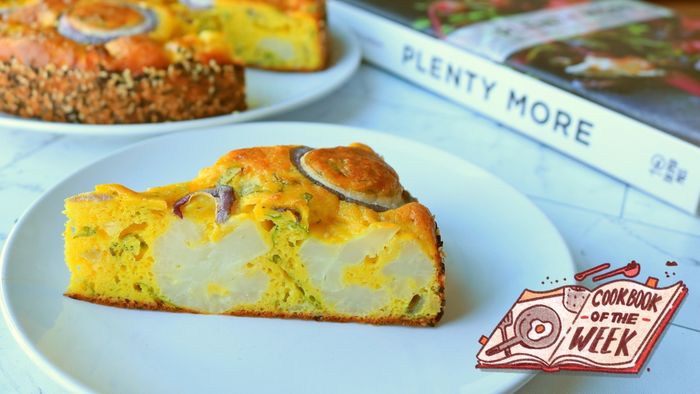 A delicious slice of vegetable cake resting on a plate.