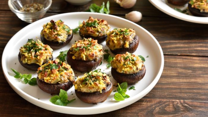 A plate of stuffed mushrooms, elegantly arranged.