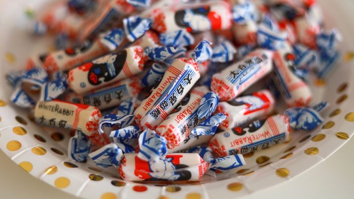 A stack of White Rabbit taffy on a paper plate