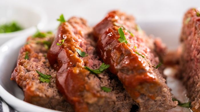 A close-up view of freshly sliced meatloaf.