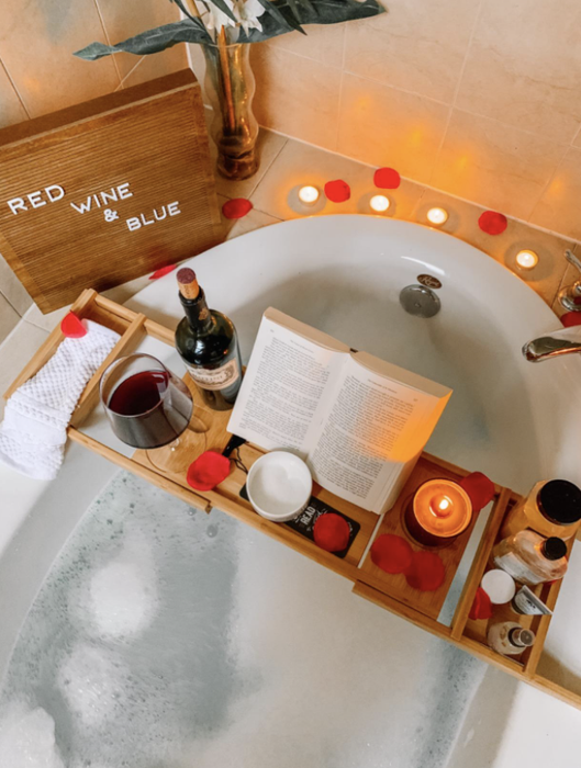 Another reviewer's photo showcasing a bathtub caddy in a bathroom setting.