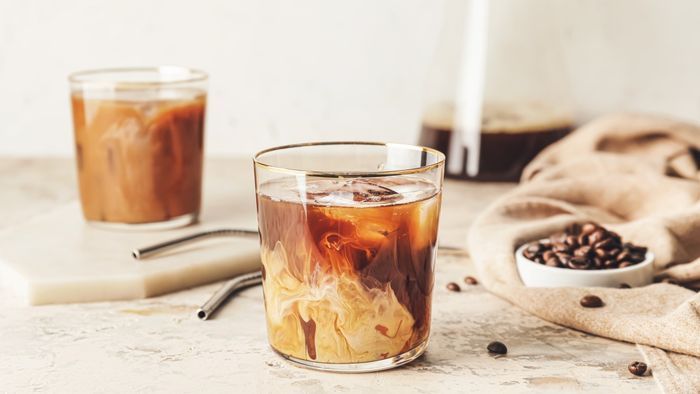 Two glasses of refreshing cold brew coffee placed on a table.