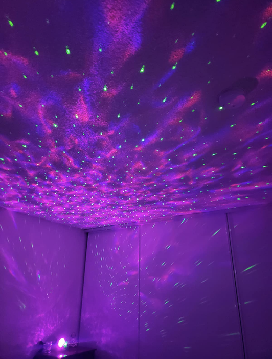 Reviewer photo of the projector set to purple mode.