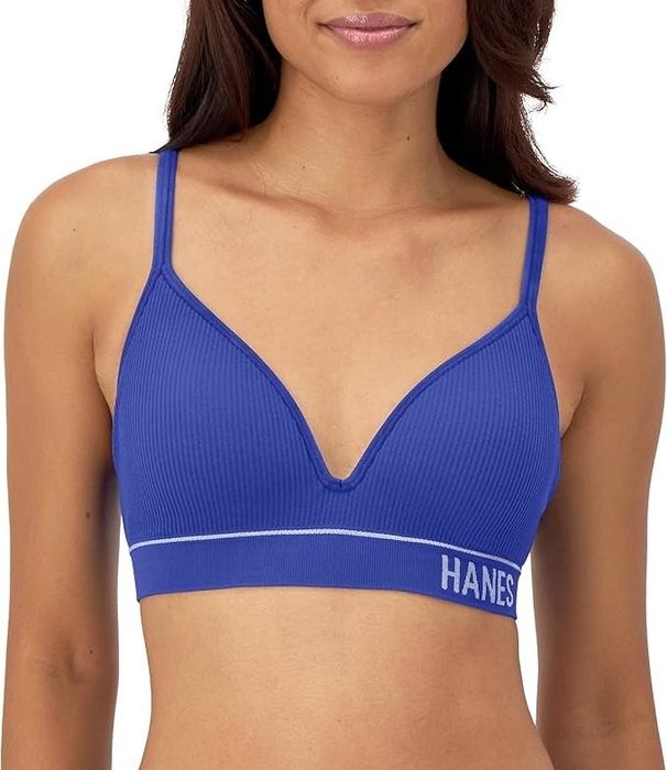 A person is wearing a ribbed V-neck bralette with slim straps and the 