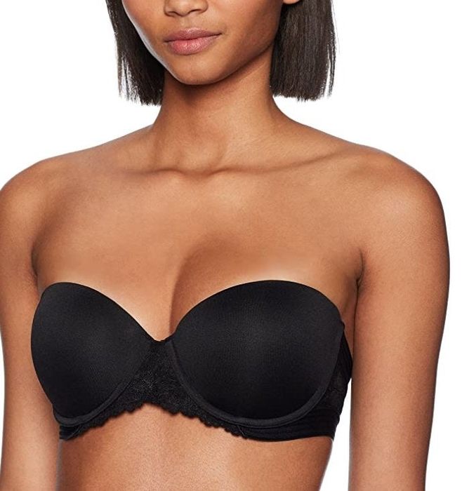 A model showcasing the bra in black, worn strapless